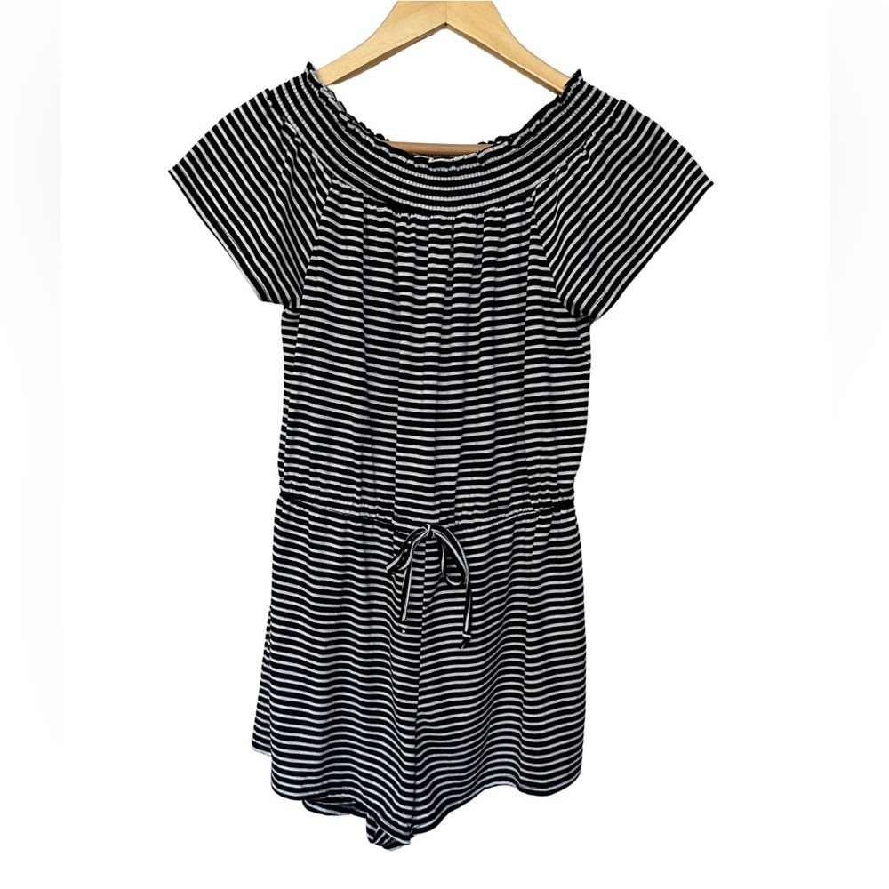 Poof black and white strip romper with tie waist.NWT